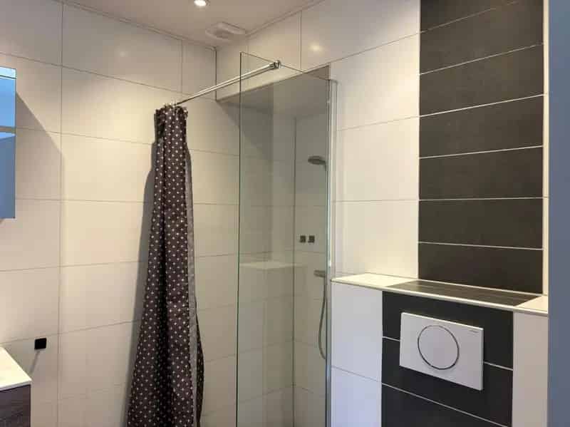 Gelijkvloerse benedenwoning met tuin in rustige woonwijk