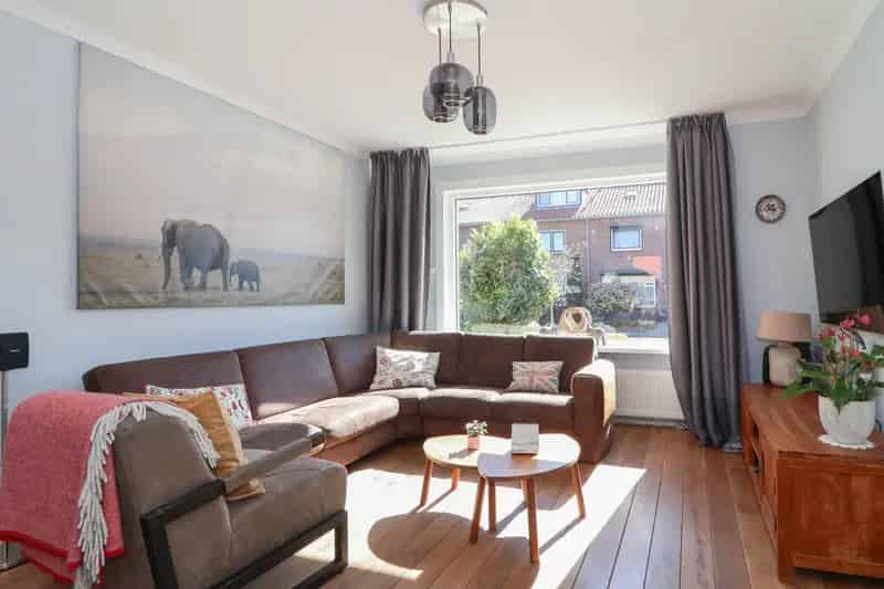 Ruime gezinswoning met XL veranda en zonnige tuin