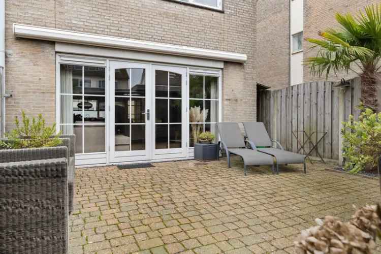 Huis te koop Poortugaal: Ruim hoekhuis met 4 slaapkamers en tuin