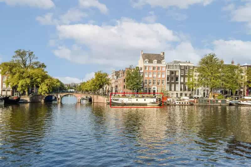 Huisboot Amstel Amsterdam 35m2 te moderniseren