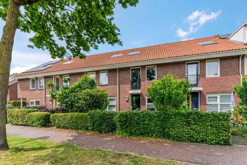Huis te koop Ede: Charmante tussenwoning met tuin en energielabel A