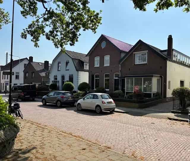 Huis te koop Renkum Kerkstraat 14: woning met bedrijfshal
