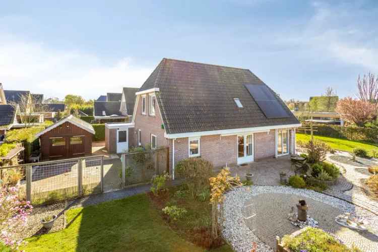 Vrijstaande woning aan het water Kollum