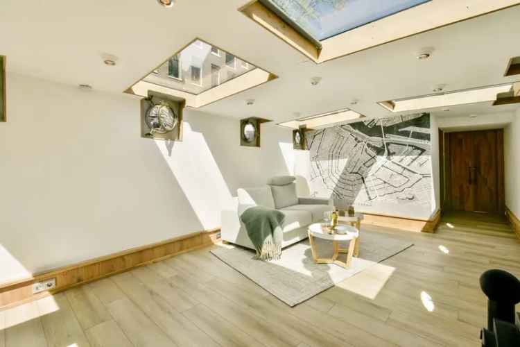 Woonboot Singel Amsterdam - Luxe Boot met Aanlegplaats