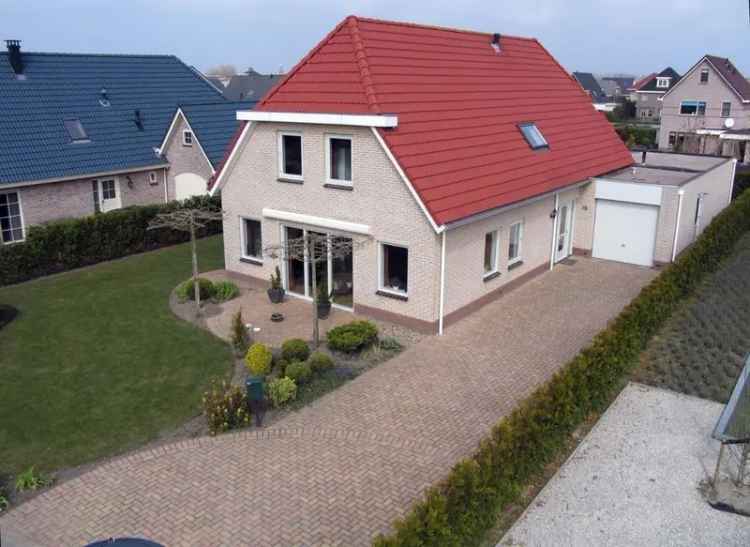 Riante benedenwoning 70 m2.