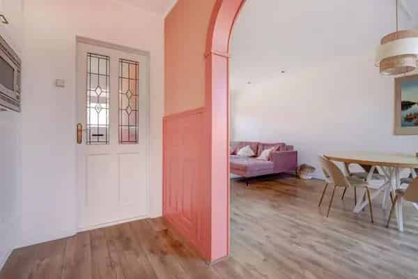 Instapklare Tussenwoning Kapelle: 2 slaapkamers, Diepe Tuin & Garage