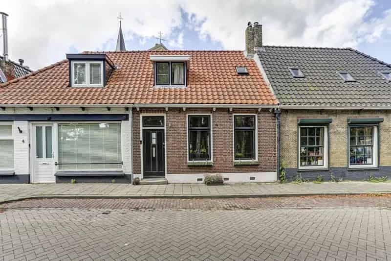 Tussenwoning Zonnemaire 2 slaapkamers moderne badkamer tuin Grevelingenmeer