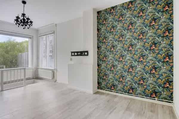 Korhaanstraat 1A Rotterdam: Gezellige woning met hobbyruimte en tuin