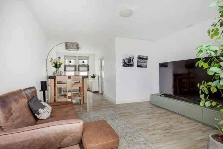 Huis te koop Rotterdam Overschie: gerenoveerd, tuin, 2 slaapkamers