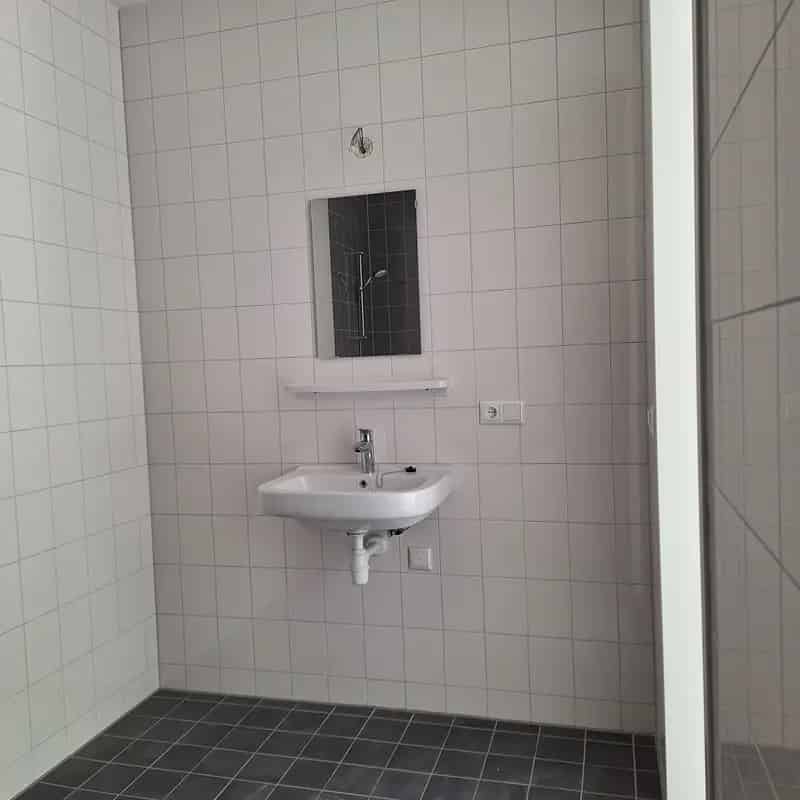 Appartement 1 slaapkamer balkon open keuken badkamer NOM