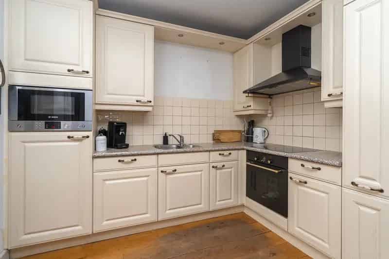 Huis te koop Tilburg: Ruime woning met multifunctionele ruimte en royale tuin