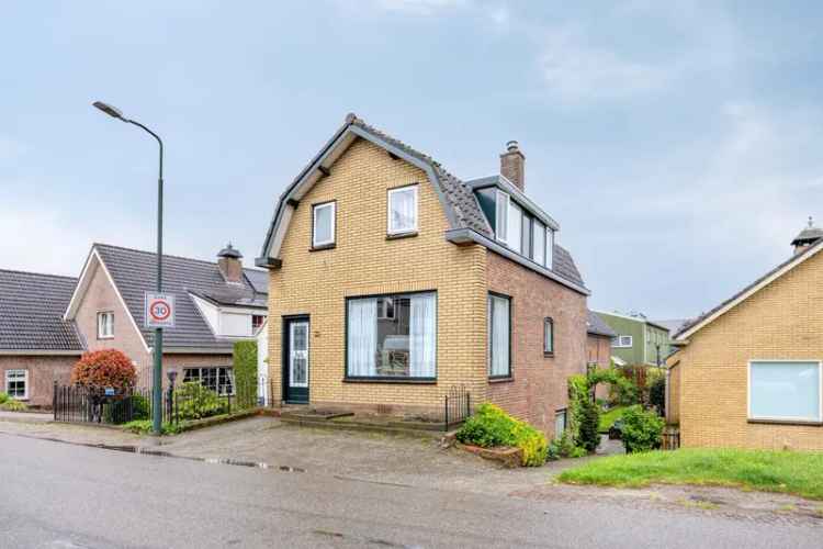 Dijkwoning Hardinxveld-Giessendam 3 slaapkamers luxe keuken tuin