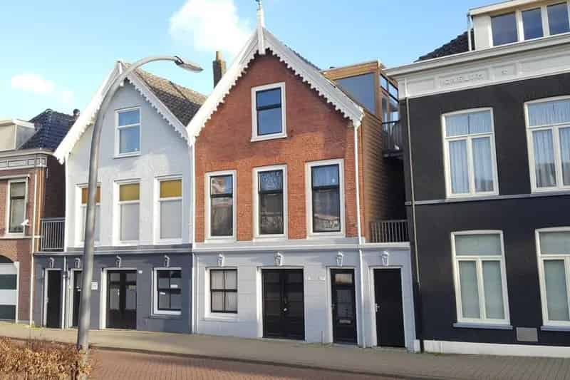 Herenhuis Schiedam 3 woonlagen bedrijfshuis 2 terrassen