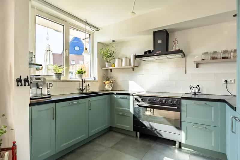 Goed onderhouden huis te koop in Rheden met 3 slaapkamers en zonnige tuin