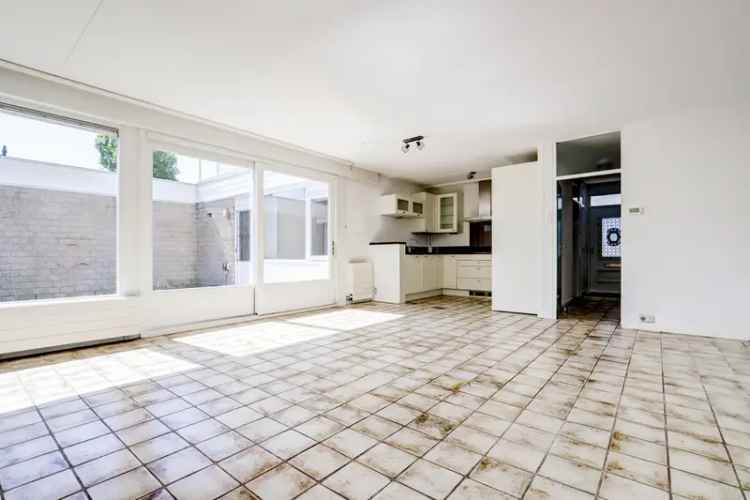 Semi-bungalow Dordrecht: Ruime woning met tuin en dakterras