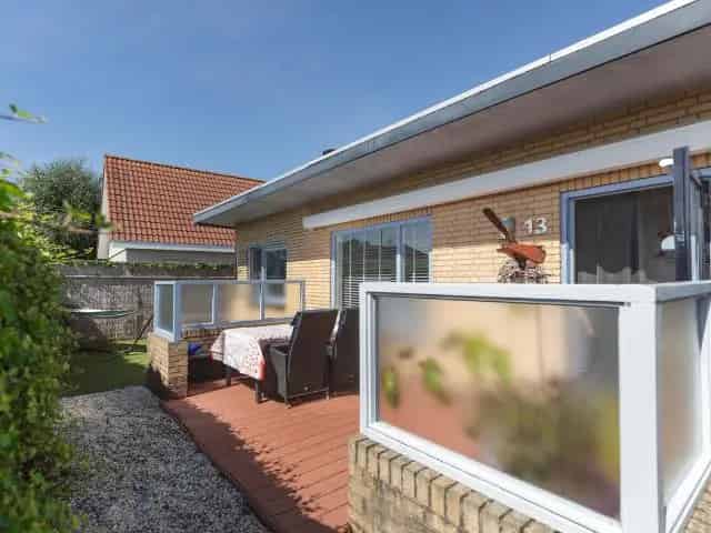 Recreatiebungalow Ouddorp  Twee slaapkamers Tuin Zuid terras