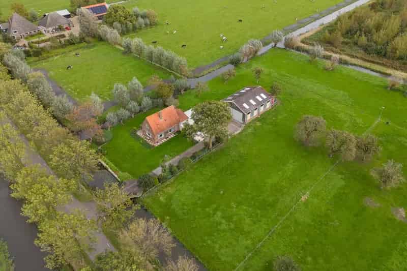 Huis te koop Westerweg Purmerend: Ruime woning met bedrijfsloods en boszicht
