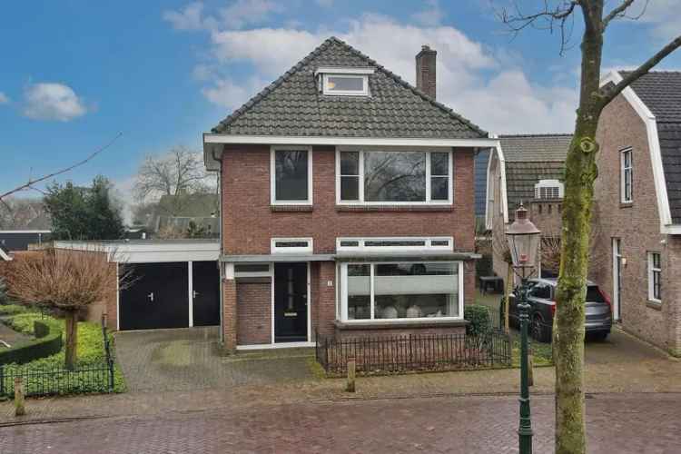 Jaren 30 woning Borne: 4 slaapkamers, moderne keuken, tuin