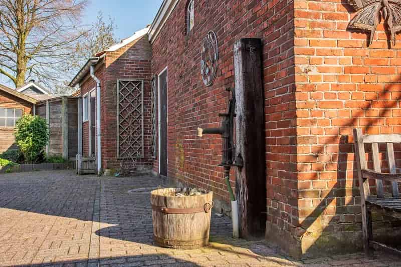 Twee Winkelpanden met Woningen te Koop in Borne Centrum