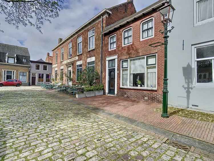 Groede Markt: Authentieke woning met garage en diepe tuin