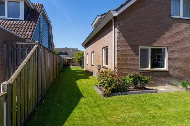 Huis te koop Kerkstraat Andel: Ruime woning met tuin en garage