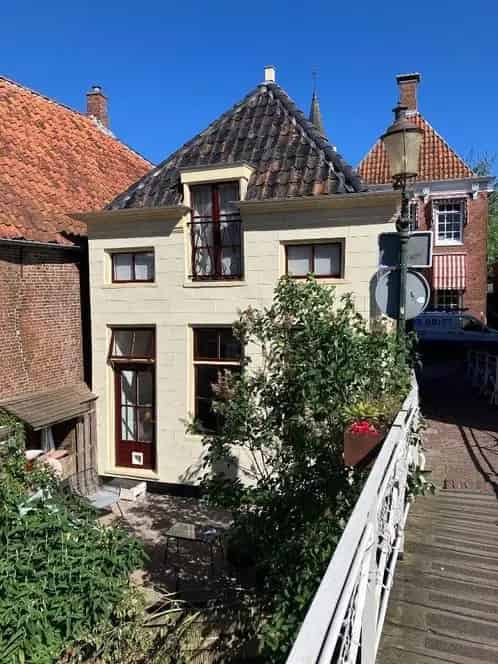 Grachtenpandje Appingedam Rijksmonument 2 slaapkamers te huur