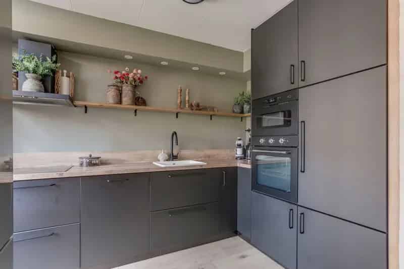Tussenwoning Rozenburg 3 slaapkamers tuin