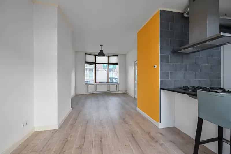 Huis te koop nabij stadscentrum met tuin en open keuken