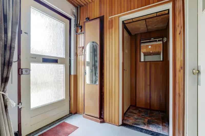 Huis te Koop Millingen aan de Rijn: Uitgebouwde Hoekwoning met Garage