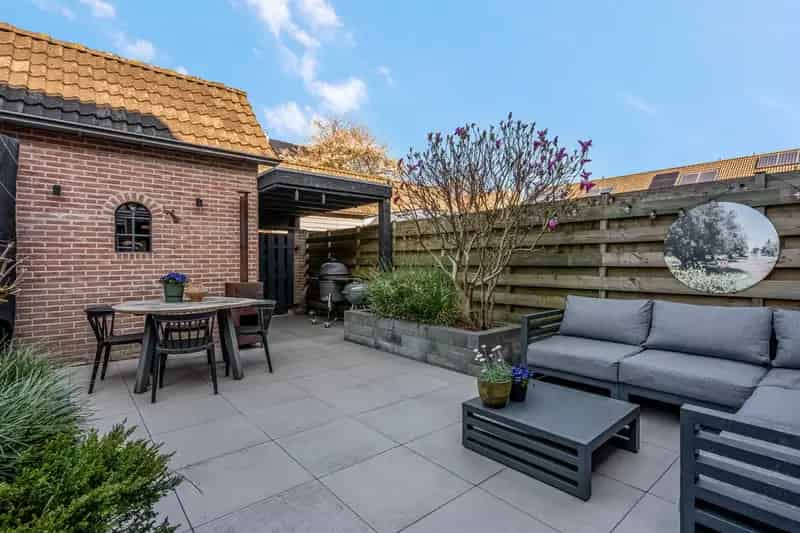 Huis te koop Woudenberg: Instapklare gezinswoning met 4 slaapkamers en tuin