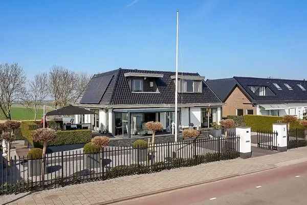 Dijkvilla Ringvaart: Luxe Woning met Zwembad Sauna en Aanlegsteiger