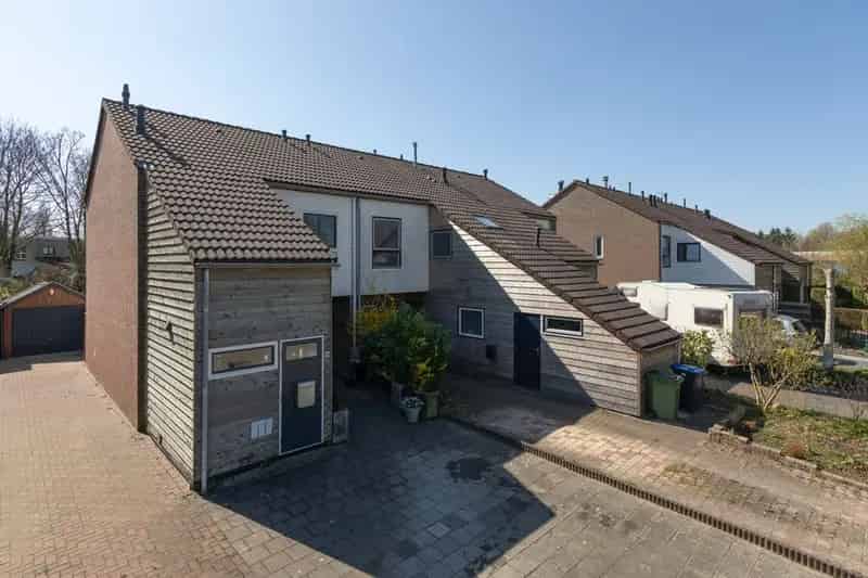 Hoekwoning te koop met garage en tuin op het zuiden