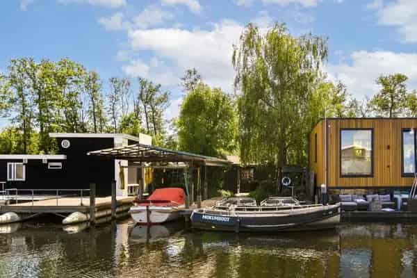 Uniek Waterperceel Amsterdam Zuid Bedrijfs Woning Loods Steiger