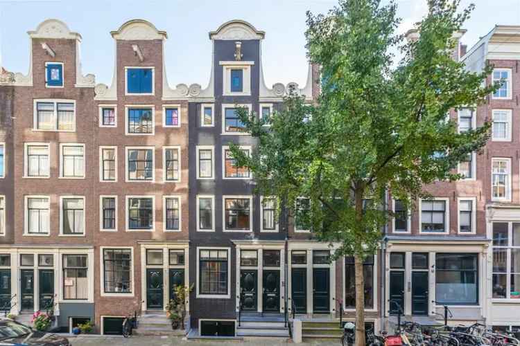 Amsterdam Centrum: Gerenoveerde Dubbele Benedenwoning 100m2 Eigen Grond