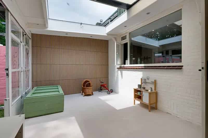 Huis te koop Amersfoort: Gemoderniseerde tussenwoning met serre en tuin