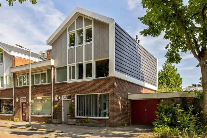 Huis te koop Amsterdam Noord Ruime Hoekwoning Kapverdieping Garage Tuin