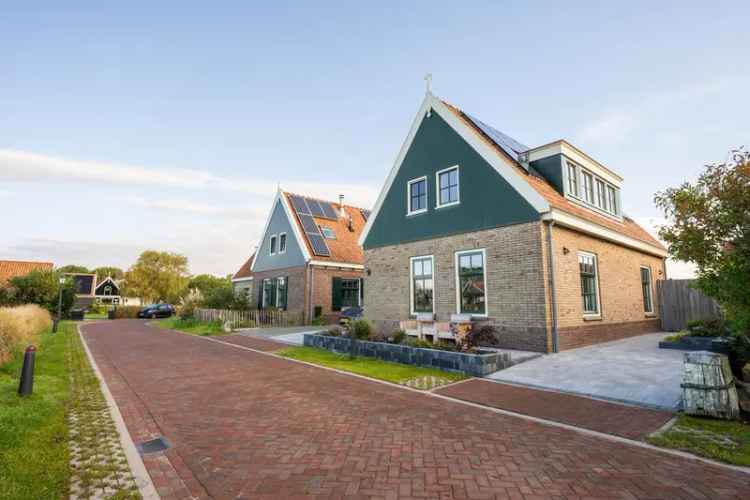 Vrijstaande woning Texelse stijl 315m2 tuin luxe keuken