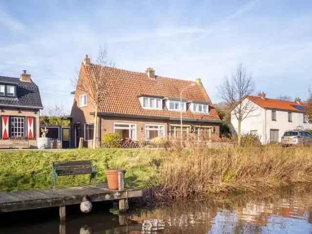 Half Vrijstaande woning te Vogelenzang met vrij uitzicht