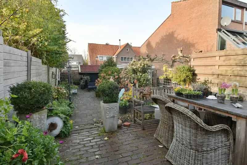 Huis te koop Muiden: karakteristieke woning met diepe tuin