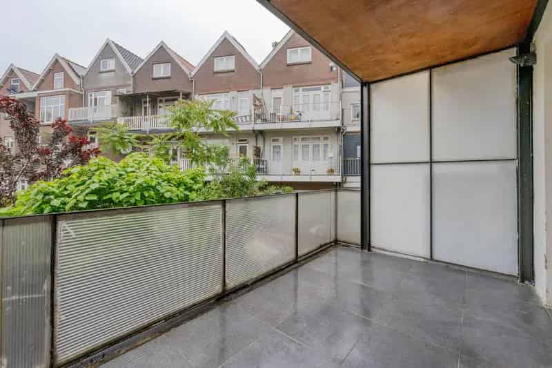 Dubbele Benedenwoning met Tuin en Dakterras te Rotterdam