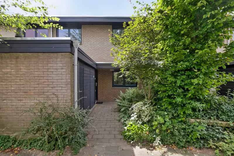 Huis te koop Amsterdam Noord: 4 slaapkamers, tuin, verduurzaamd