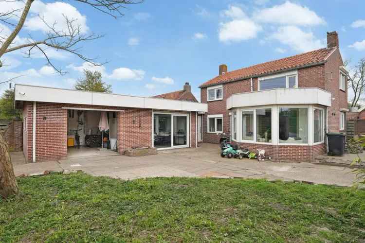 Vrijstaande woning begane grond wonen grote garage royale tuin