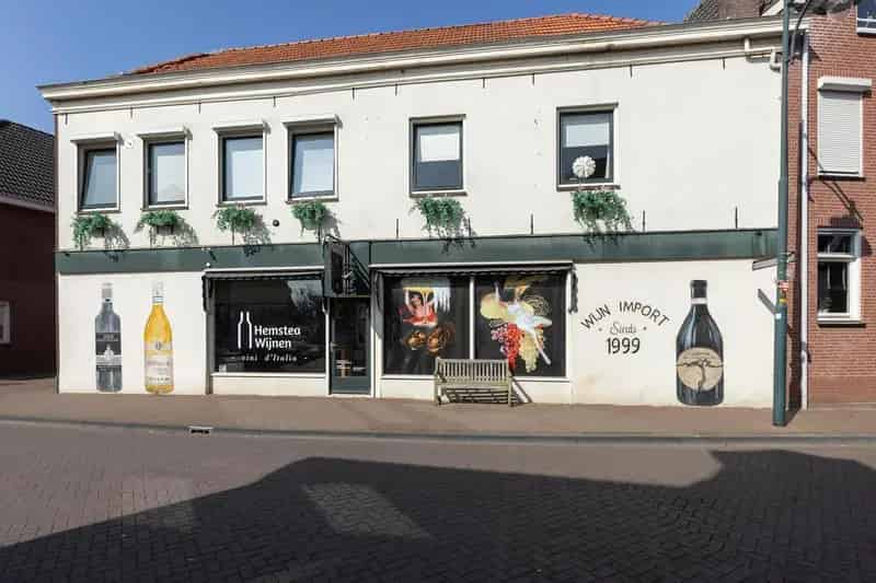 Beleggingspand Groenlo: Historisch Woon Winkelpand met 2 Appartementen