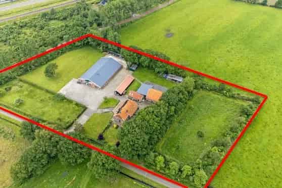 Woonboerderij met Bedrijfsruimtes te Koop Nijverdal