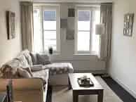 Appartement Maastricht: moderne badkamer, keuken en slaapkamer
