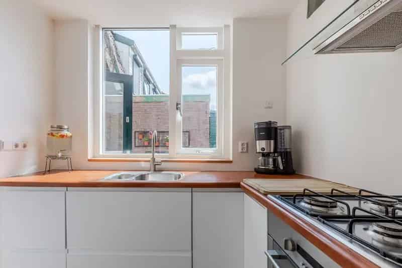 Huis te koop Wormerveer: Gerestaureerde woning met tuin