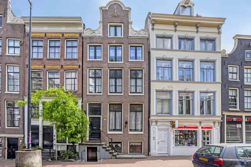 Amsterdam Centrum: Unieke 153m2 Woning, 3 Lagen plus Kelder