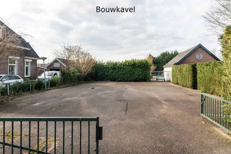 Woonboerderij met Bijgebouwen en Bouwkavel