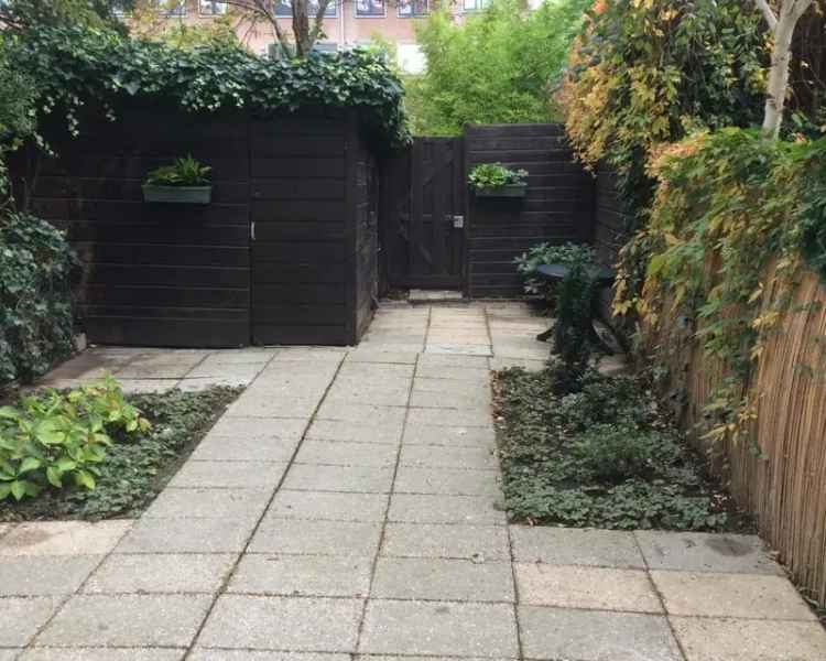 Gezellig Maas-zicht Appartement met Tuin Nabij Universiteit