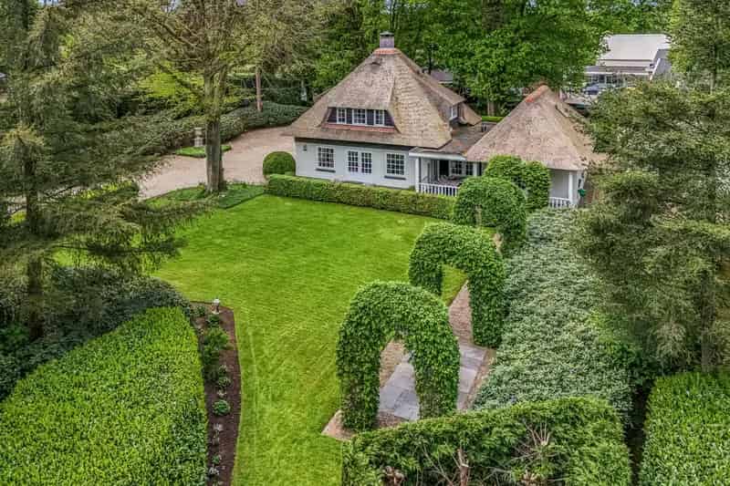 Rietgedekte Villa Garderen: Luxe, Rust en Natuur